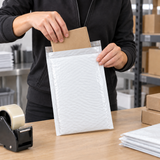 Size #1 poly bubble mailer in use at a commercial packing station