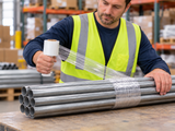 3 inch 80 gauge banding stretch wrap bundling metal tubes in a warehouse
