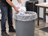 Garbage Bags - 42" x 48" - Clear - Strong - 50-55 gal - 100/Case fitted in an opaque commercial waste bin in an office workroom