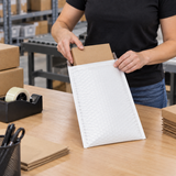Size #5 poly bubble mailer in use at a commercial packing station